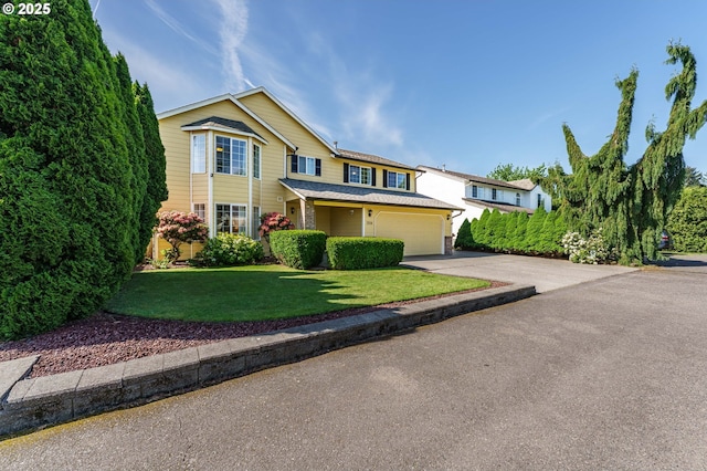 2614 NE 176th Ave, Vancouver, WA 98684 - traditional-style home with concrete driveway, a garage, and a front yard