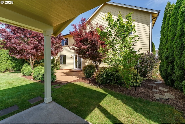 2614 NE 176th Ave, Vancouver, WA 98684 - view of front of house with a patio area and a front lawn