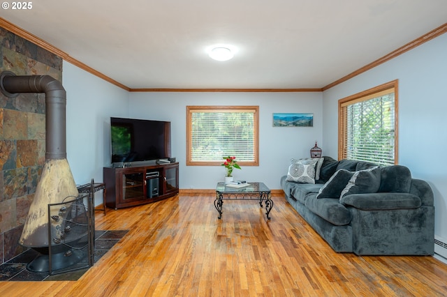 10001 SW 35th Ave, Portland, OR 97219 - living room featuring hardwood / wood-style floors, crown molding, and a wood stove