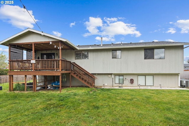 3780 SE 21st Dr, Gresham, OR 97080 - back of house with stairway, a lawn, a deck, cooling unit, and roof with shingles
