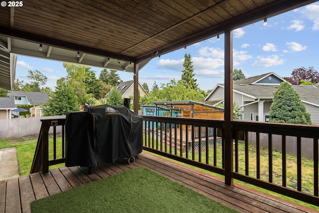 3780 SE 21st Dr, Gresham, OR 97080 - wooden terrace featuring a fenced backyard, a grill, and a residential view