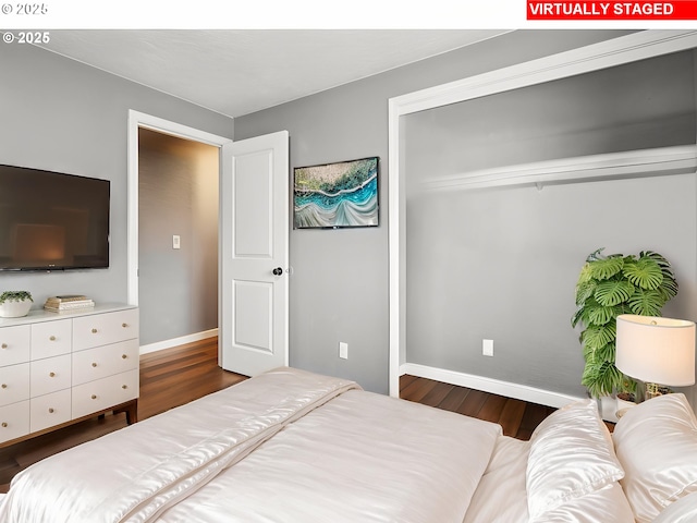 3780 SE 21st Dr, Gresham, OR 97080 - bedroom with wood finished floors, baseboards, and a closet