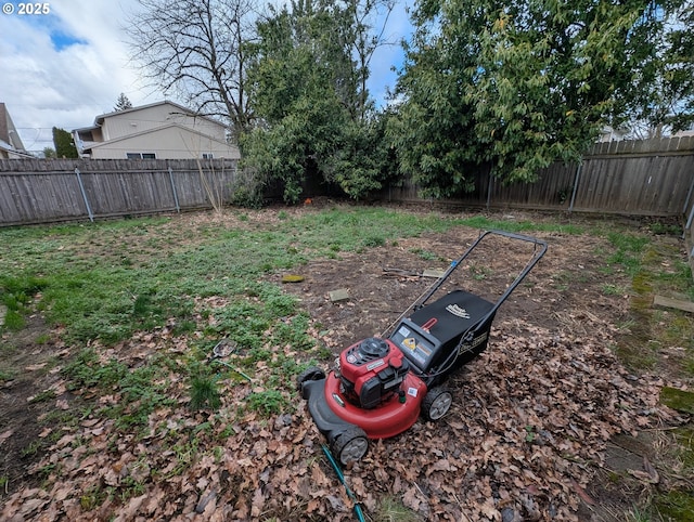 view of yard with a fenced backyard