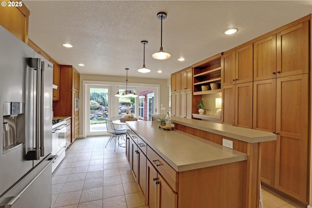 10455 NW Laidlaw Rd, Portland, OR 97229 - kitchen featuring appliances with stainless steel finishes, light countertops, recessed lighting, brown cabinetry, and open shelves