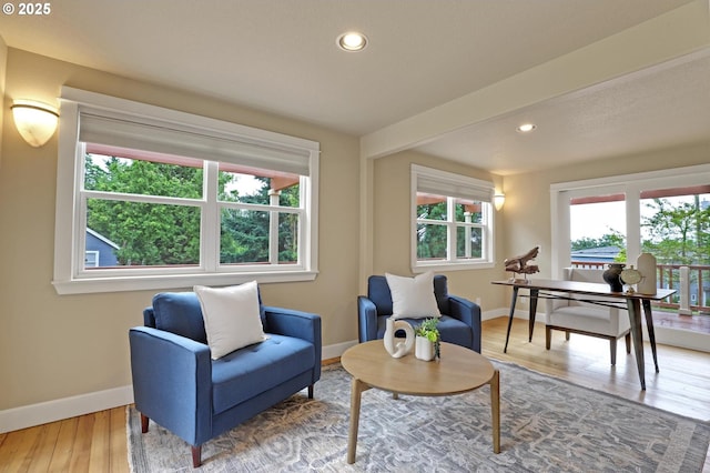 10455 NW Laidlaw Rd, Portland, OR 97229 - living area with wood finished floors and recessed lighting