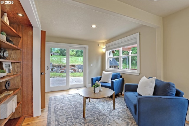 10455 NW Laidlaw Rd, Portland, OR 97229 - sitting room with light wood-style flooring, plenty of natural light, and recessed lighting