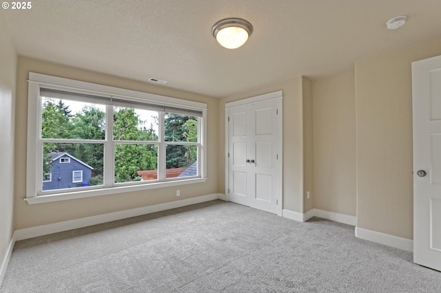 10455 NW Laidlaw Rd, Portland, OR 97229 - unfurnished bedroom with carpet floors and baseboards