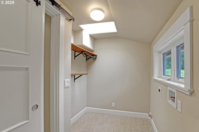 10455 NW Laidlaw Rd, Portland, OR 97229 - washroom featuring hookup for an electric dryer, hookup for a washing machine, a barn door, and carpet floors