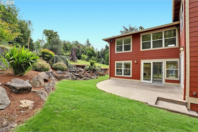 10455 NW Laidlaw Rd, Portland, OR 97229 - view of green lawn featuring a patio area
