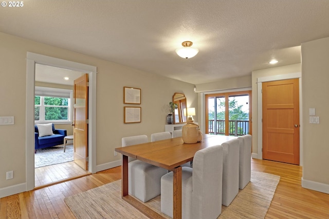 10455 NW Laidlaw Rd, Portland, OR 97229 - dining space featuring light wood-style flooring, recessed lighting, and a textured ceiling