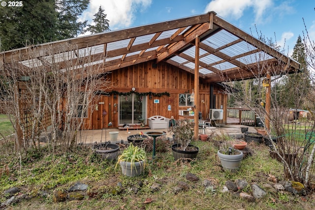 rear view of property with a patio