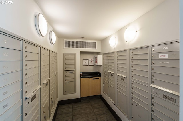 1260 NW Naito Pkwy Unit 200B, Portland, OR 97209 - exercise room featuring a tray ceiling and baseboards
