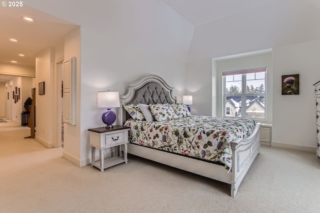 bedroom featuring light carpet