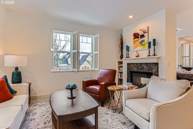 sitting room with a fireplace