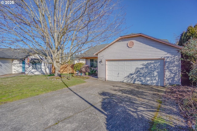 exterior space featuring a garage and a front lawn