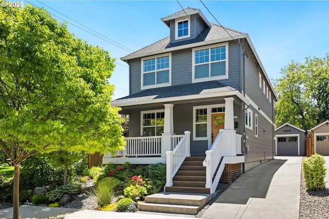 2516 N Watts St, Portland, OR 97217 - traditional style home featuring a porch, a detached garage, an outbuilding, and a shingled roof