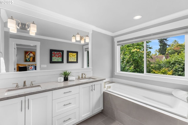 2516 N Watts St, Portland, OR 97217 - full bathroom with healthy amount of natural light, double vanity, tile patterned floors, a bath, and ornamental molding