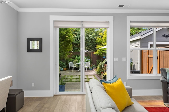 2516 N Watts St, Portland, OR 97217 - doorway with wood finished floors and ornamental molding