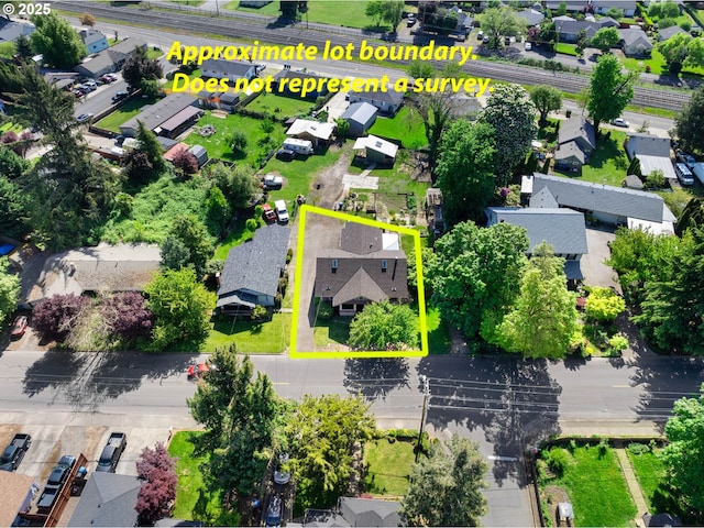 682 S Settlemier Ave, Woodburn, OR 97071 - aerial view of residential area with property boundaries highlighted