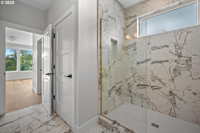 bathroom featuring tiled shower