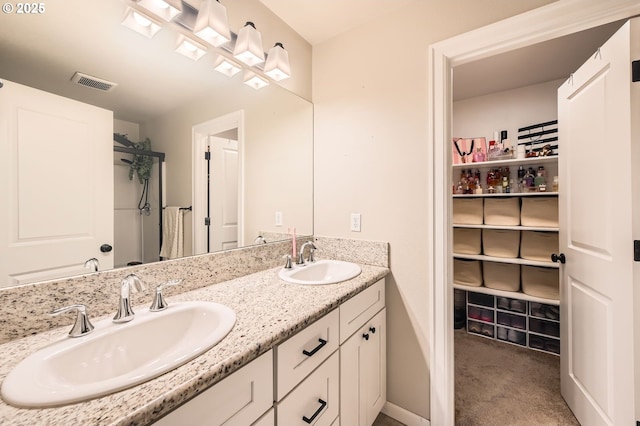 1225 NE Rockwell Dr, Estacada, OR 97023 - full bathroom featuring double vanity, baseboards, and a closet