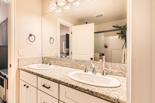 1225 NE Rockwell Dr, Estacada, OR 97023 - ensuite bathroom with double vanity and a shower with shower door