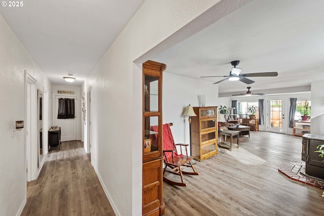 2745 34th St, Coos Bay, OR 97420 - hallway with wood finished floors, baseboards, and a textured wall