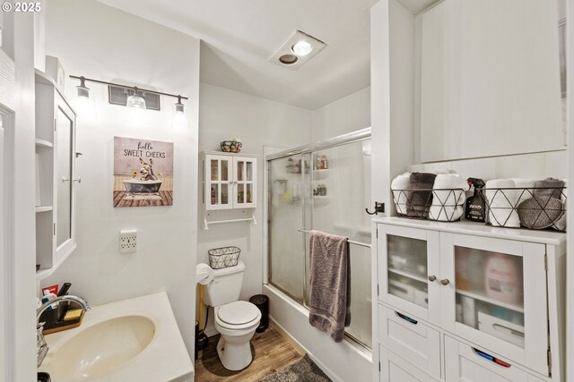 2745 34th St, Coos Bay, OR 97420 - bedroom with wood finished floors and ceiling fan