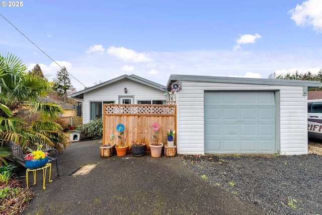 garage with fence