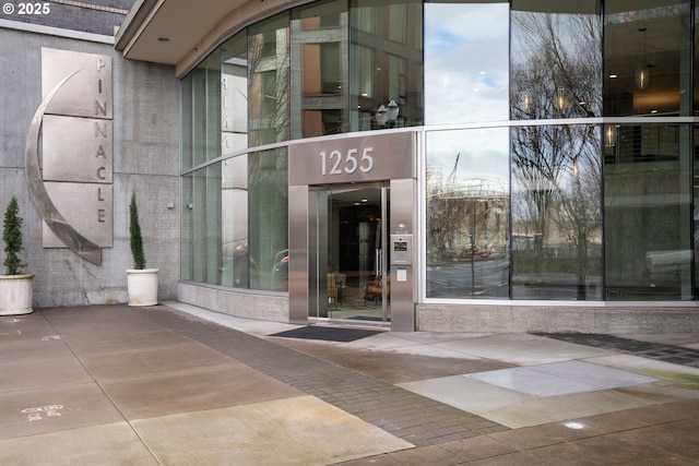 doorway to property featuring elevator