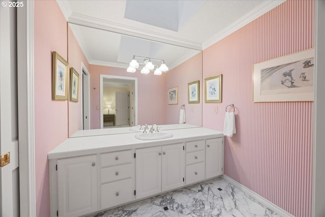 bathroom featuring crown molding, baseboards, an inviting chandelier, marble finish floor, and vanity