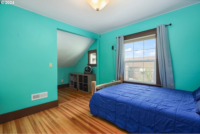 bedroom featuring wood-type flooring