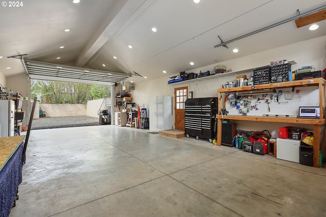 garage with a workshop area