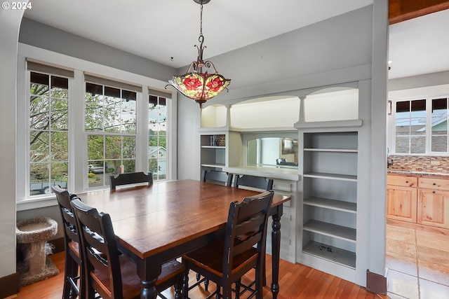 dining room with light wood-type flooring