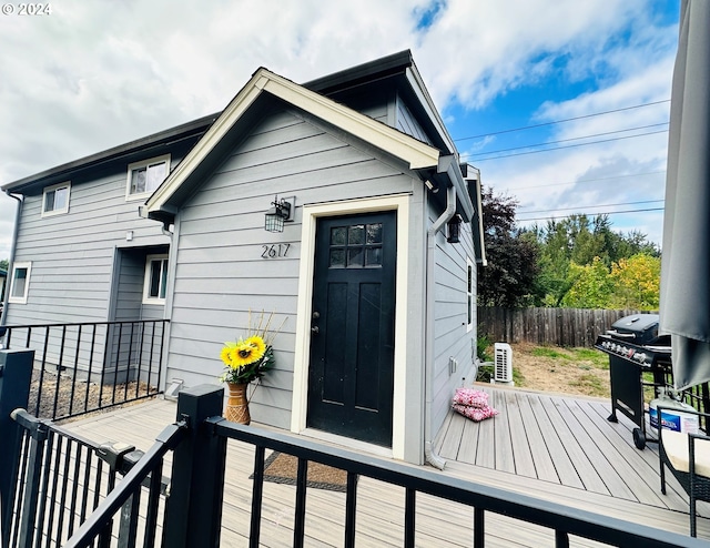 doorway to property with a deck