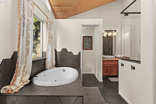 bathroom featuring a whirlpool tub, wooden ceiling, tile patterned flooring, lofted ceiling, and vanity