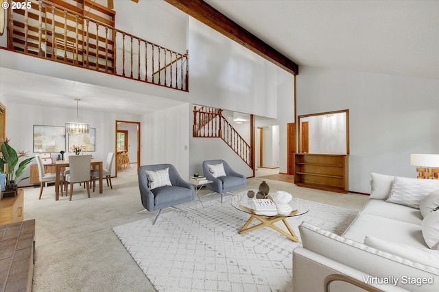 living room with stairs, carpet, high vaulted ceiling, and beamed ceiling