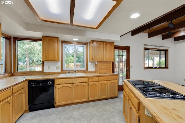 kitchen featuring black appliances, a sink, light colored carpet, butcher block counters, and recessed lighting