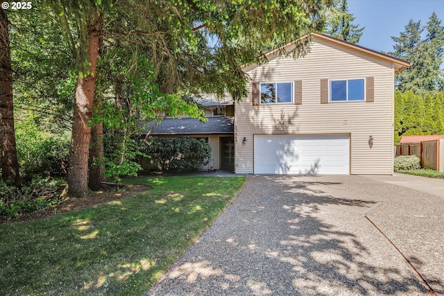 traditional-style house with driveway and a garage