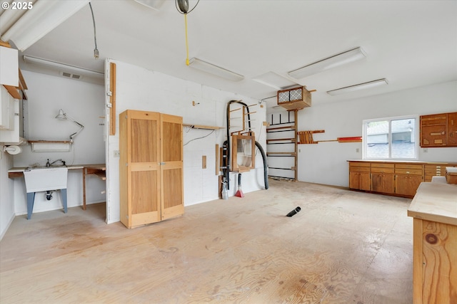 garage featuring a sink