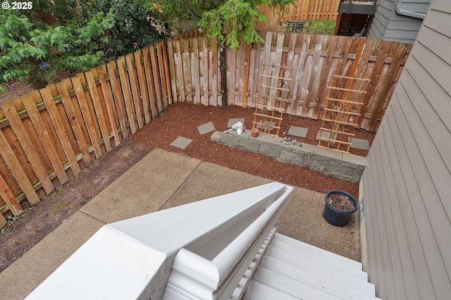 view of patio with a fenced backyard