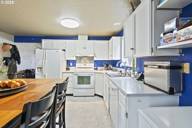 14717 NE 51st St, Vancouver, WA 98682 - kitchen with white appliances, a sink, light countertops, white cabinets, and a textured ceiling