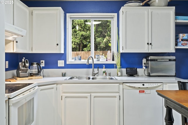 14717 NE 51st St, Vancouver, WA 98682 - kitchen featuring white appliances, a sink, white cabinetry, under cabinet range hood, and light countertops