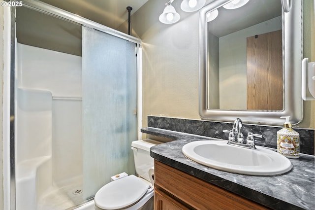 14717 NE 51st St, Vancouver, WA 98682 - bathroom featuring a shower stall, toilet, and vanity