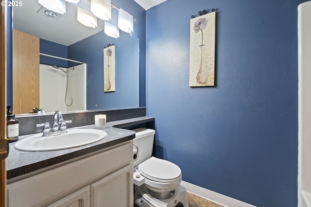 14717 NE 51st St, Vancouver, WA 98682 - full bath with toilet, baseboards, vanity, and a shower