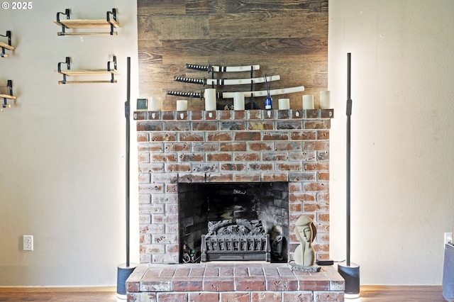 14717 NE 51st St, Vancouver, WA 98682 - detailed view of wood finished floors, a fireplace, and baseboards