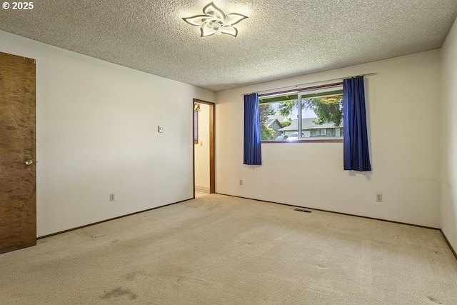 540 NE 23rd Pl, Gresham, OR 97030 - carpeted empty room featuring a textured ceiling and baseboards