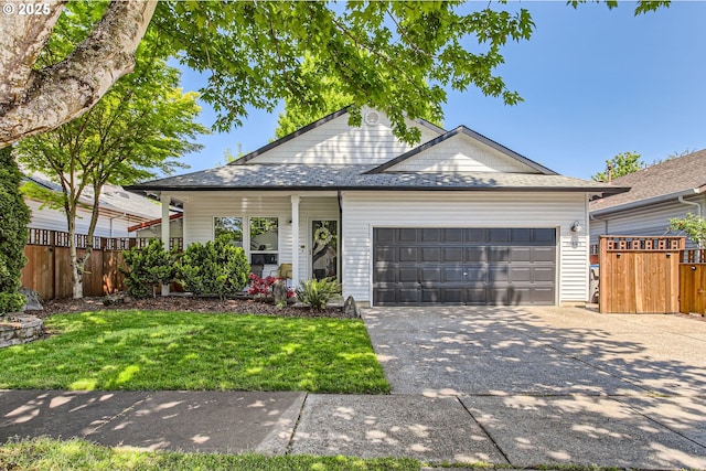 16893 SW Roosevelt St, Sherwood, OR 97140 - ranch-style home with a front yard, fence, a garage, and driveway