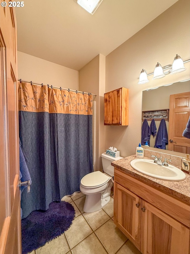 25405 SE Bear Creek Rd, Prineville, OR 97754 - bathroom with tile patterned floors, vanity, toilet, and curtained shower