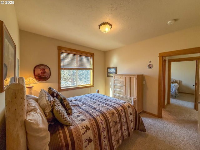 25405 SE Bear Creek Rd, Prineville, OR 97754 - bedroom with baseboards and light colored carpet
